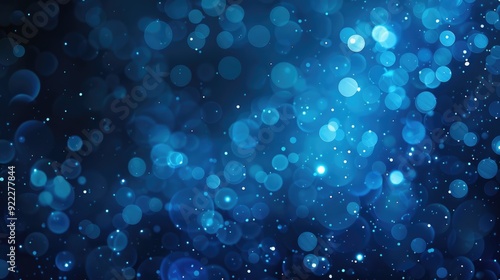 Abstract blue blurry unfocused sparkle glitter blue bokeh background wallpaper with copy space. Blue Christmas glitter design background.
