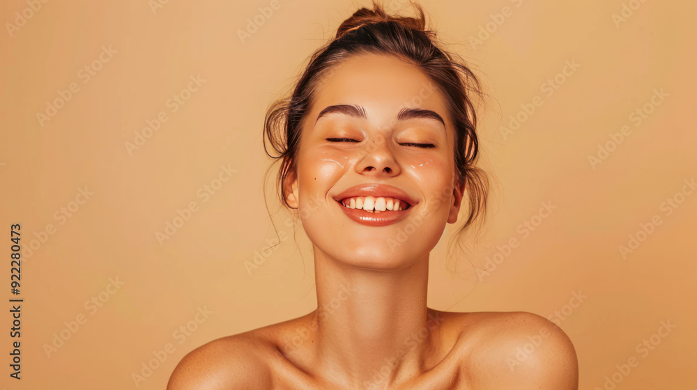 Joyful woman with bare shoulders, relaxing during beauty treatment, beige background, spa concept Joyful woman with bare shoulders, relaxing during beauty treatment, beige background, spa concept