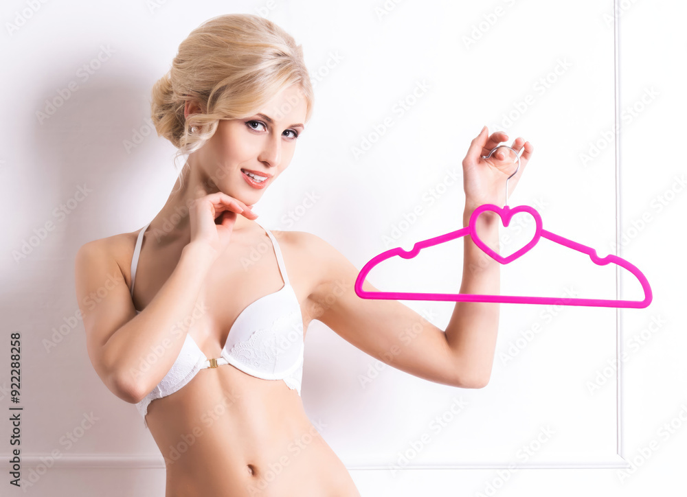 Sensual and beautiful young girl in a bridal lingerie over retro background Sensual and beautiful young girl in a bridal lingerie over retro background