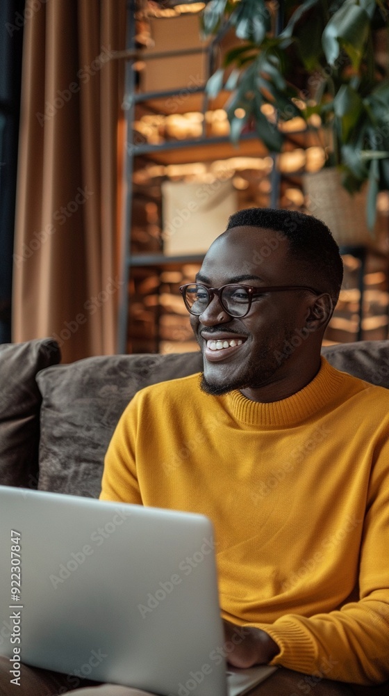 Cheerful professional in vibrant yellow sweater working on laptop from cozy home office, surrounded by warm lighting and lush indoor plants. Cheerful professional in vibrant yellow sweater working on laptop from cozy home office, surrounded by warm lighting and lush indoor plants.