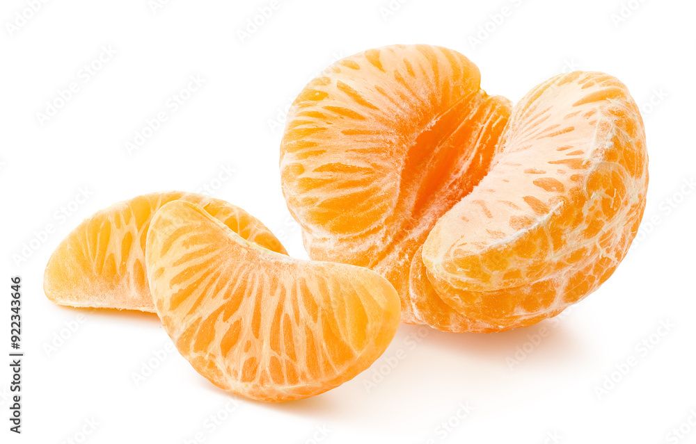 Half and pieces or segments of peeled mandarin or clementine on white background Half and pieces or segments of peeled mandarin or clementine on white background