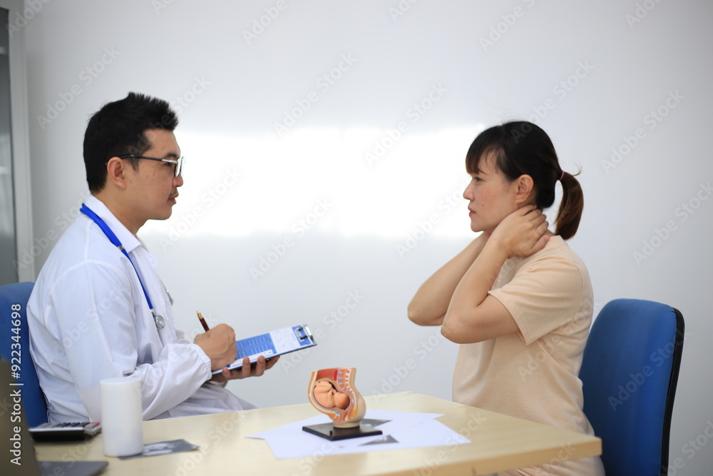 Male doctor with experience examining young pregnant women Male doctor with experience examining young pregnant women