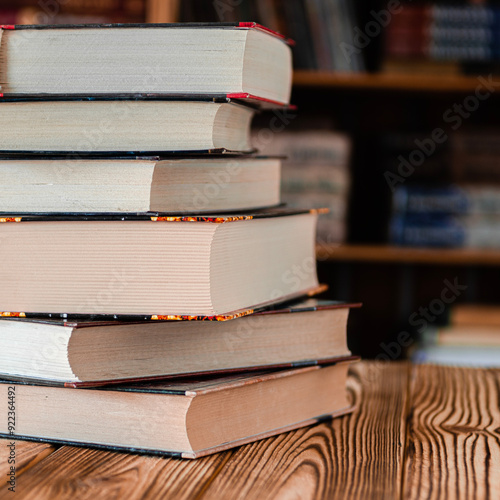 Old books are stacked in the library. Books