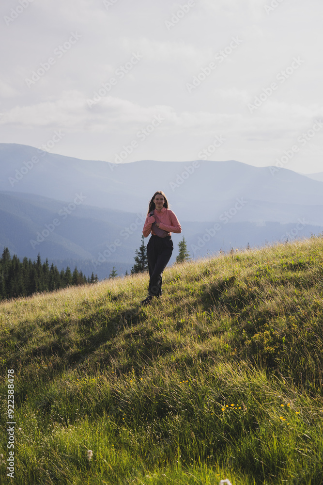 young woman on the background of silhouettes of mountains, travel, hiking, impressions, happiness, rest, smile, young woman on the background of silhouettes of mountains, travel, hiking, impressions, happiness, rest, smile,