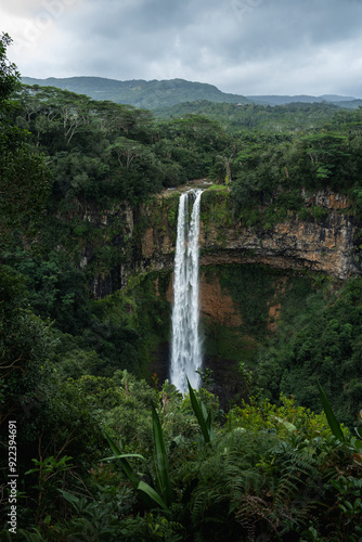 A huge waterfall on a moody day in the jungle of Mauritius, Africa.  photo