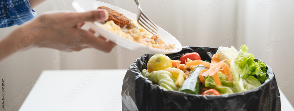 Fototapeta people put bio trash from food waste in domestic homes to compost bins to make fertilizer to reduce global environmental pollution.