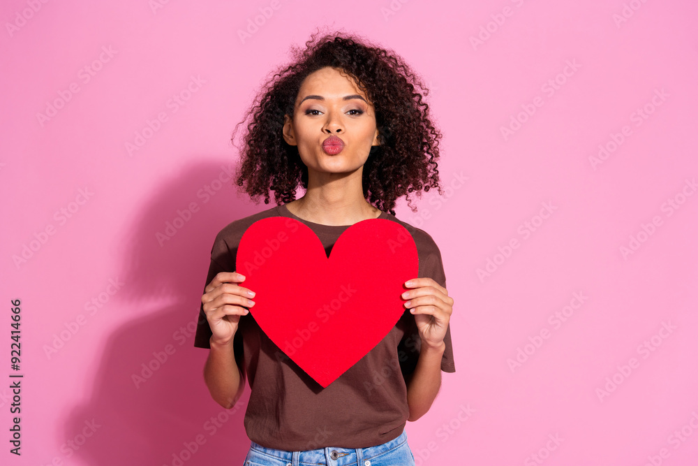 Photo of adorable lovely cute pretty girl wear brown stylish clothes hold paper card send kiss isolated on pink color background Photo of adorable lovely cute pretty girl wear brown stylish clothes hold paper card send kiss isolated on pink color background