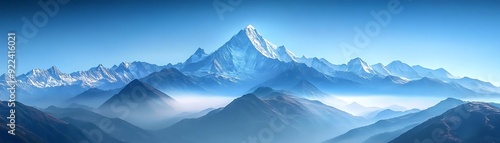 Majestic Mountain Range with Snow-Capped Peaks and Misty Valleys - Photo