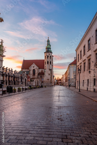 Krakow old town, romanesque St Andrew church on Grodzka street during colorful sunrise