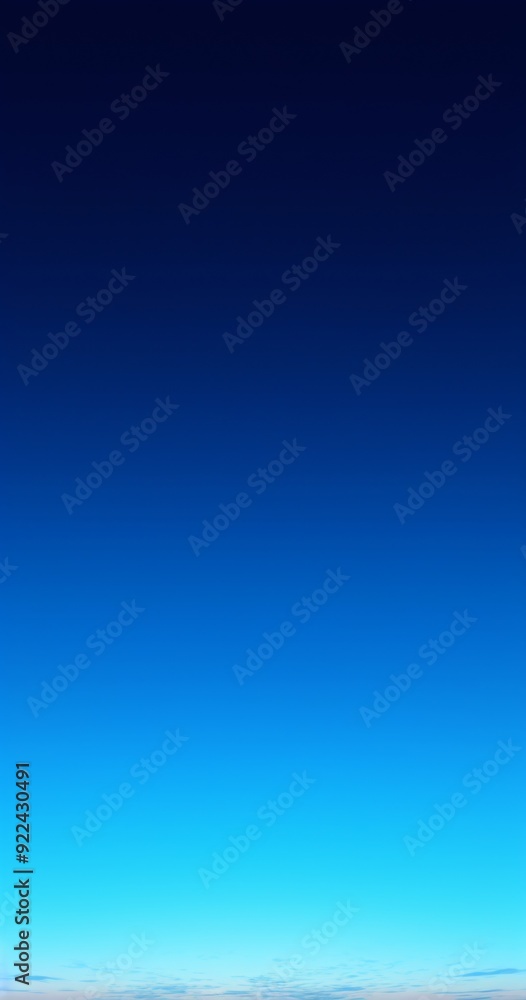 A blue rectangular background with a gradient from top to bottom A blue rectangular background with a gradient from top to bottom