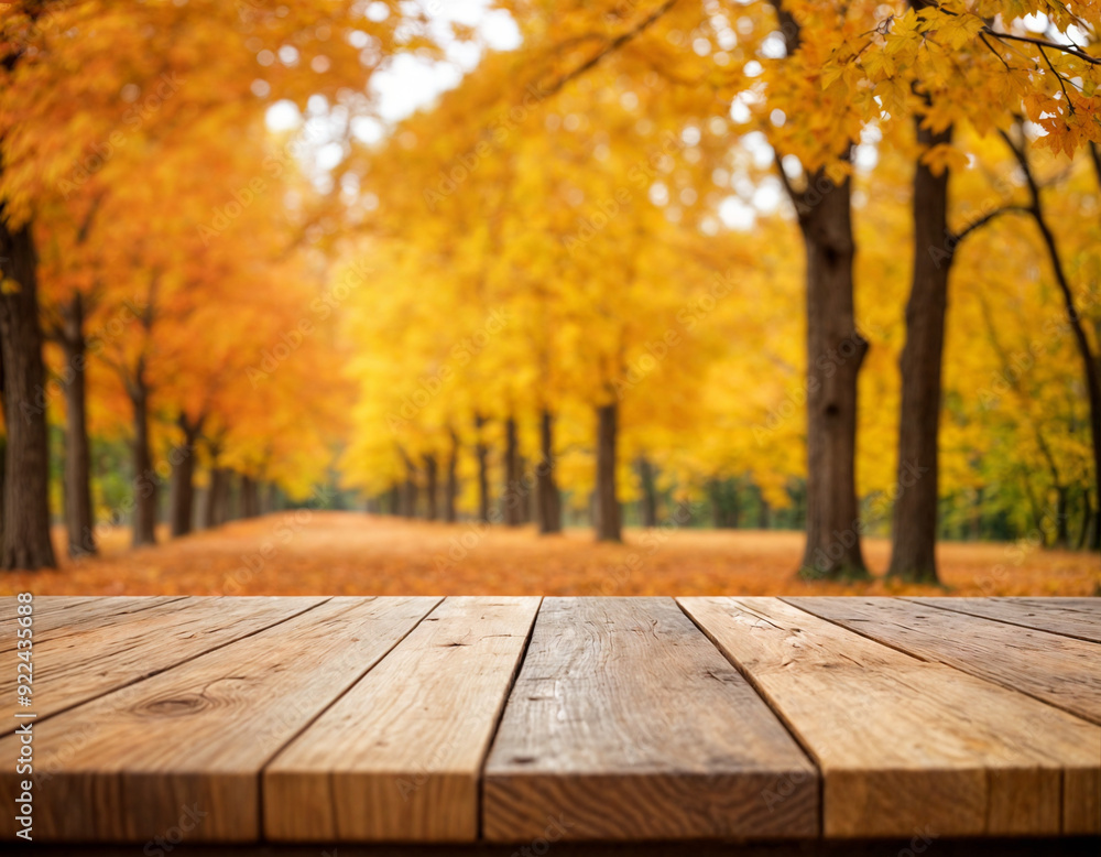 The empty wooden table top with blur background of autumn Maple leaves. Exuberant image The empty wooden table top with blur background of autumn Maple leaves. Exuberant image