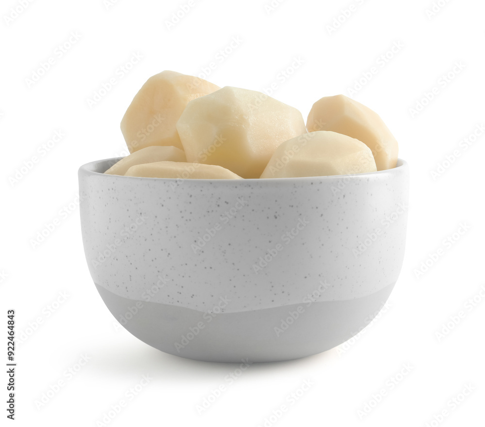 Fresh raw potatoes in bowl isolated on white Fresh raw potatoes in bowl isolated on white