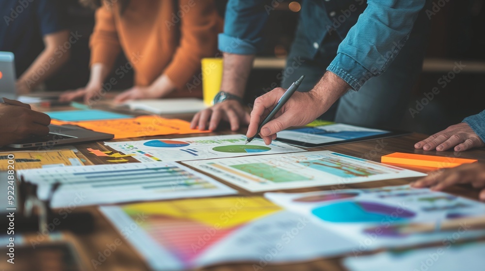 team of investors evaluating a startup's pitch deck to determine its viability team of investors evaluating a startup's pitch deck to determine its viability