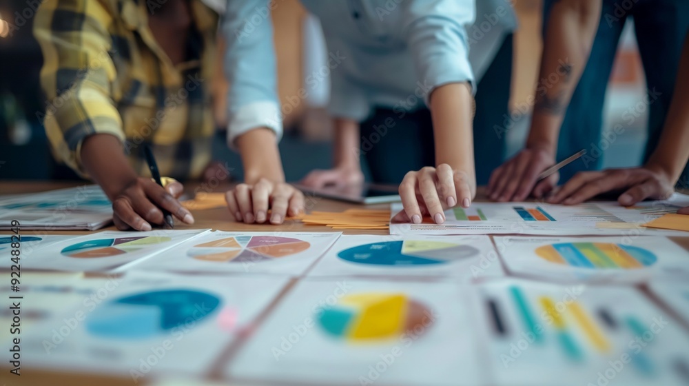 team of investors evaluating a startup's pitch deck to determine its viability team of investors evaluating a startup's pitch deck to determine its viability