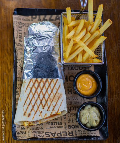 French-Moroccan tacos with french fries and ketchup. Restaurant concept images