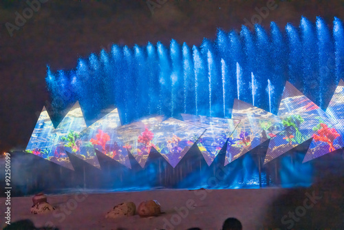 Singapore - August 19, 2023: Laser, light, water and sound show. Wings of time performed on the beach in Sentosa