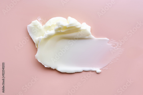 Tableau sur toile Texture of cosmetic butter on a pink background