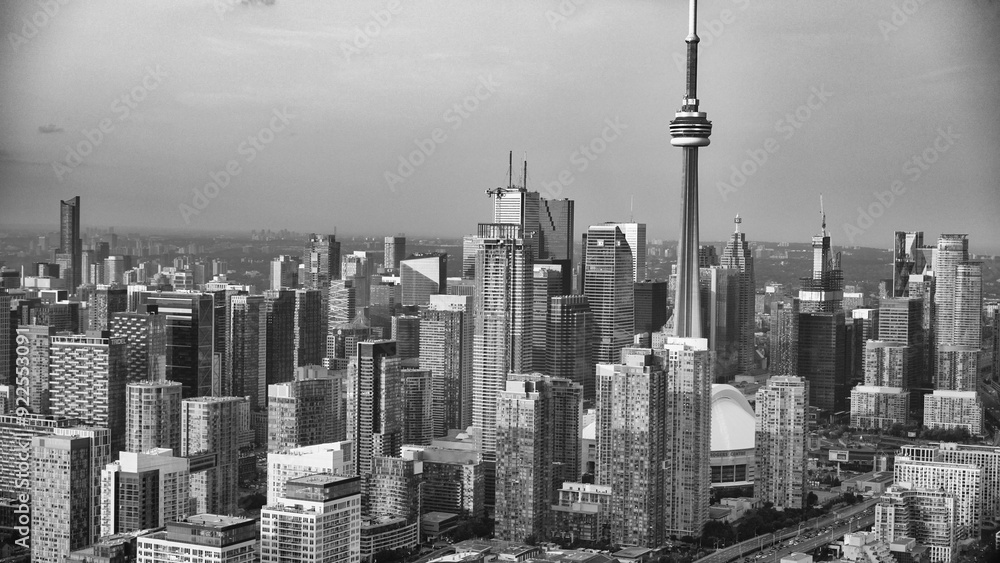 Aerial view of Toronto skyline from helicopter on a beautiful summer sunset, Ontario - Canada Aerial view of Toronto skyline from helicopter on a beautiful summer sunset, Ontario - Canada