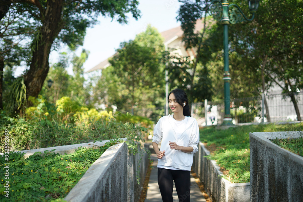 young woman running in the park young woman running in the park