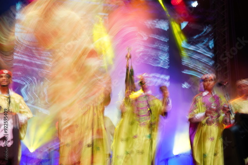 Moroccan musician playing a traditional Moroccan instrument (Qaraqab) Morocco Essaouira on 15-05-2023