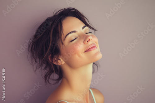 Wallpaper Mural A close up of a woman's face with her eyes closed Torontodigital.ca