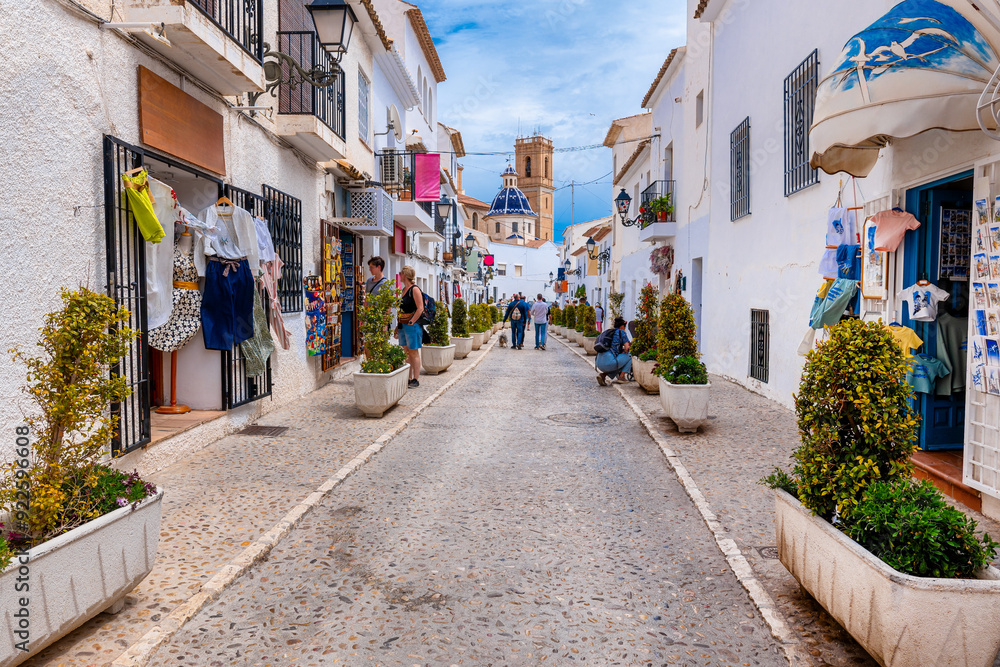 Cityscape of Altea with shops and church in background, Costa Blanca, Spain Cityscape of Altea with shops and church in background, Costa Blanca, Spain