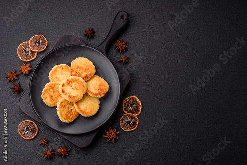 Delicious fresh sweet cheese pancakes with raisins and cinnamon