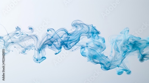 A colorful, swirling line of smoke with a blue and green section