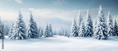 Christmas-themed greeting card featuring a snowy landscape with fir trees, ideal for the inclusion of a copy space image, perfect for the holiday season.