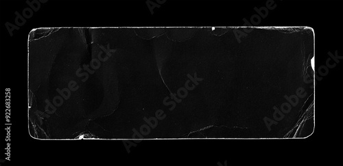 Old Black Paper Peeled Sticker Label. Round Corners. Grunge Dirty Dusty Surface Distressed Isolated on Black Background. Hight Quality.