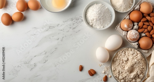 Cooking Ingredients on Marble Counter for Baking Eggs and Almonds in a Cozy K...