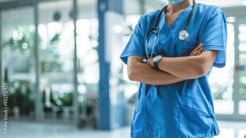 The doctor in blue scrubs photo