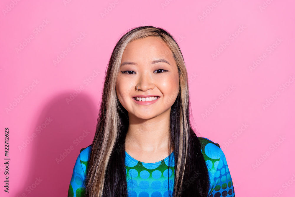 Photo of cheerful pretty lady dressed blue shirt smiling empty space isolated pink color background Photo of cheerful pretty lady dressed blue shirt smiling empty space isolated pink color background