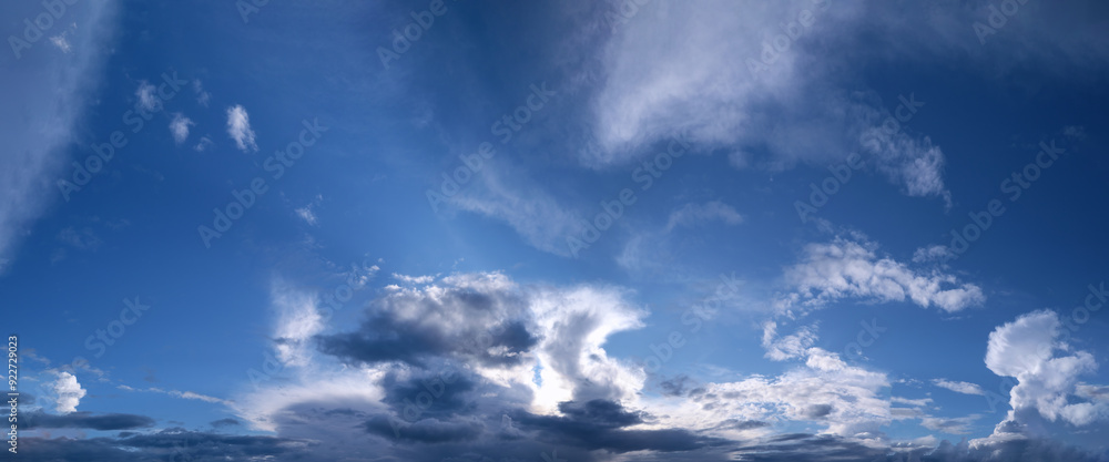Obraz premium Real amazing panoramic sunrise or sunset sky with gentle colorful clouds. Long panorama.