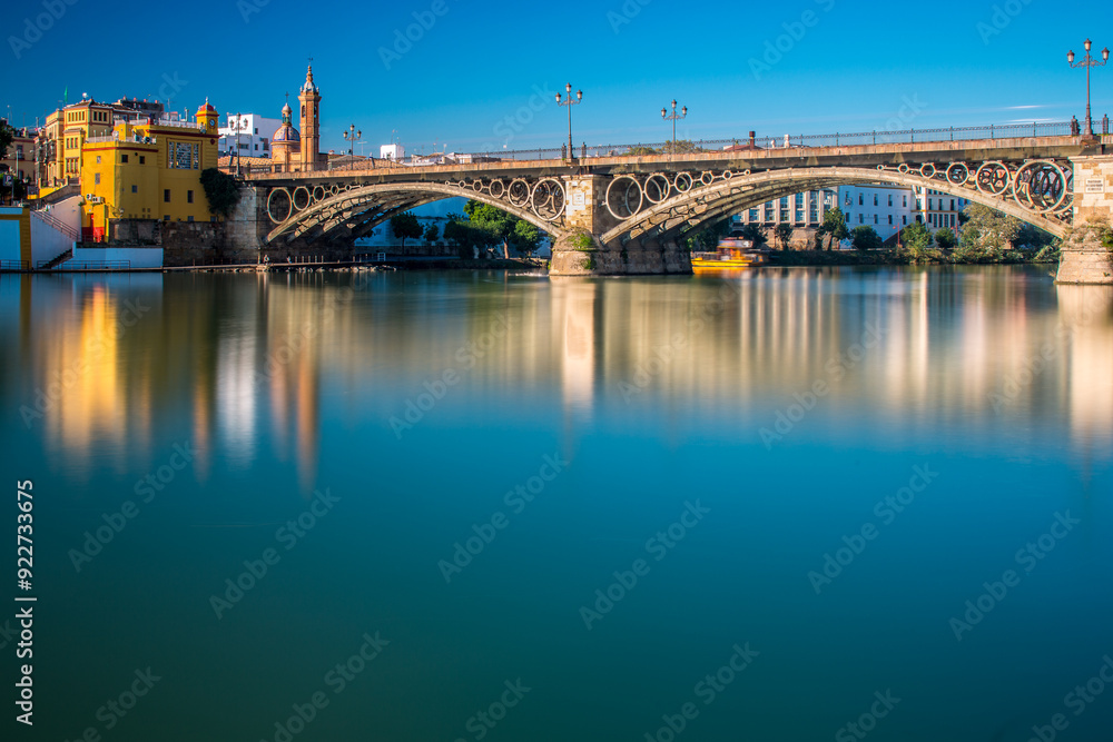 Daytime Long Exposure of Triana Bridge in Sevilla Andalucia Daytime Long Exposure of Triana Bridge in Sevilla Andalucia
