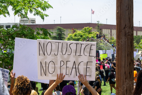 No justice no peace - BLM Protest Sign - person holding protest sign photo