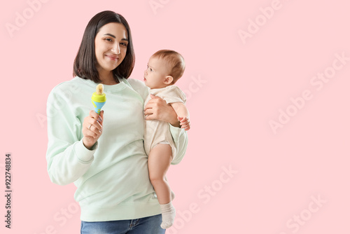Young woman with her little...