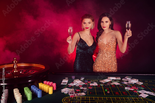 Photo of gorgeous chic people girl players celebrate new year x mas in poker club raise cocktail for jackpot victory photo