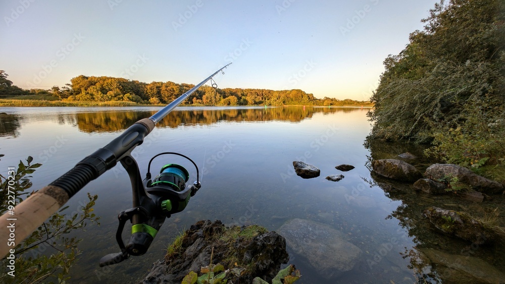 fishing rod and reel, fishing at Corrib river at Galway, Ireland, spinning, angling, catch and release, sport and leisure, nature background