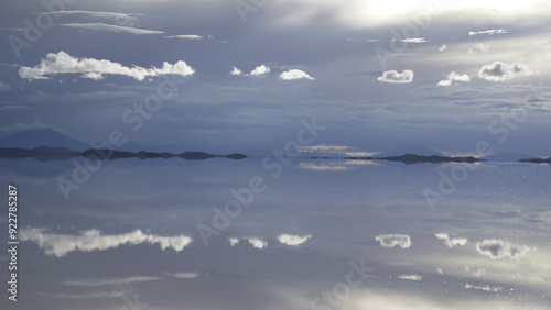 Reflecting clouds at sunset in the salt lake Salar de Uyuni, Bolivie, Bolivia, South America photo