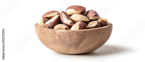 A Wooden Bowl Filled with Brazil Nuts photo