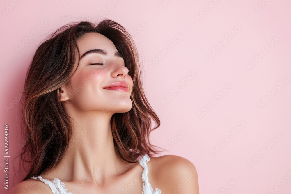 A close up of a woman's face with her eyes closed A close up of a woman's face with her eyes closed