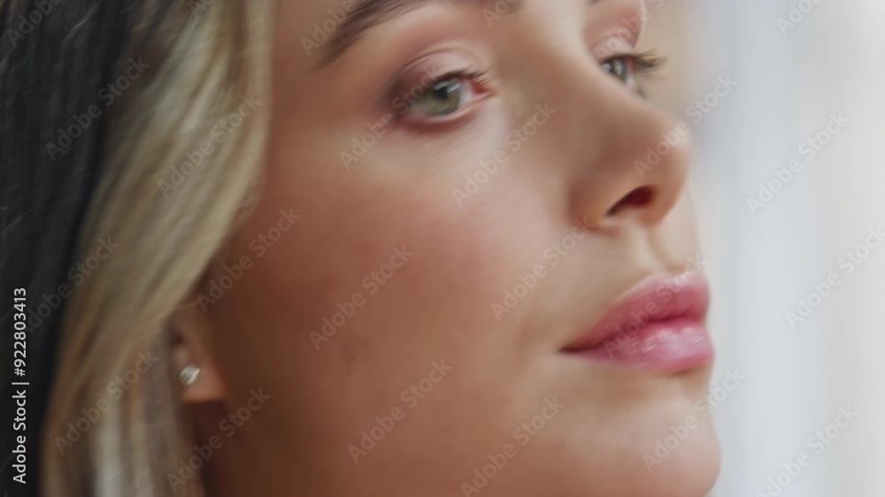 Closeup woman rubbing face with lotion at home place. Girl skincare routine Closeup woman rubbing face with lotion at home place. Girl skincare routine