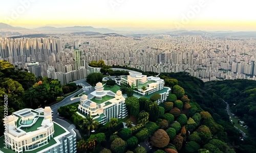 Drone flying towards luxurious mansions on Hollywood Hills in Los Angeles. luxury residences and villas in Hollywood Hills.  Aerial vertical, vertical video background.