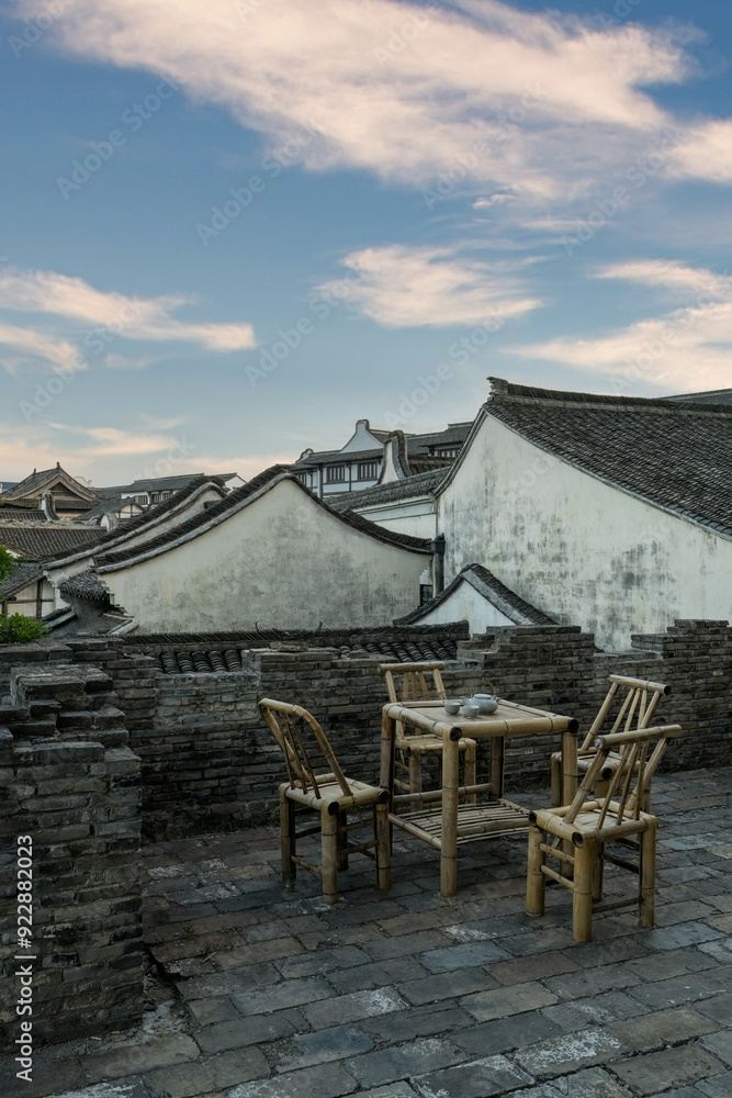 Bamboo table and chairs on the balcony of a Chinese building. Bamboo table and chairs on the balcony of a Chinese building.