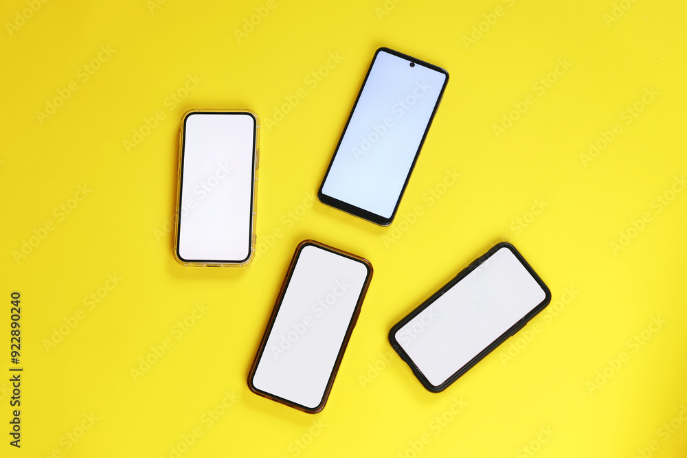 Smartphone Displaying White Blank Screen For Application Mockup Over Yellow Background Smartphone Displaying White Blank Screen For Application Mockup Over Yellow Background