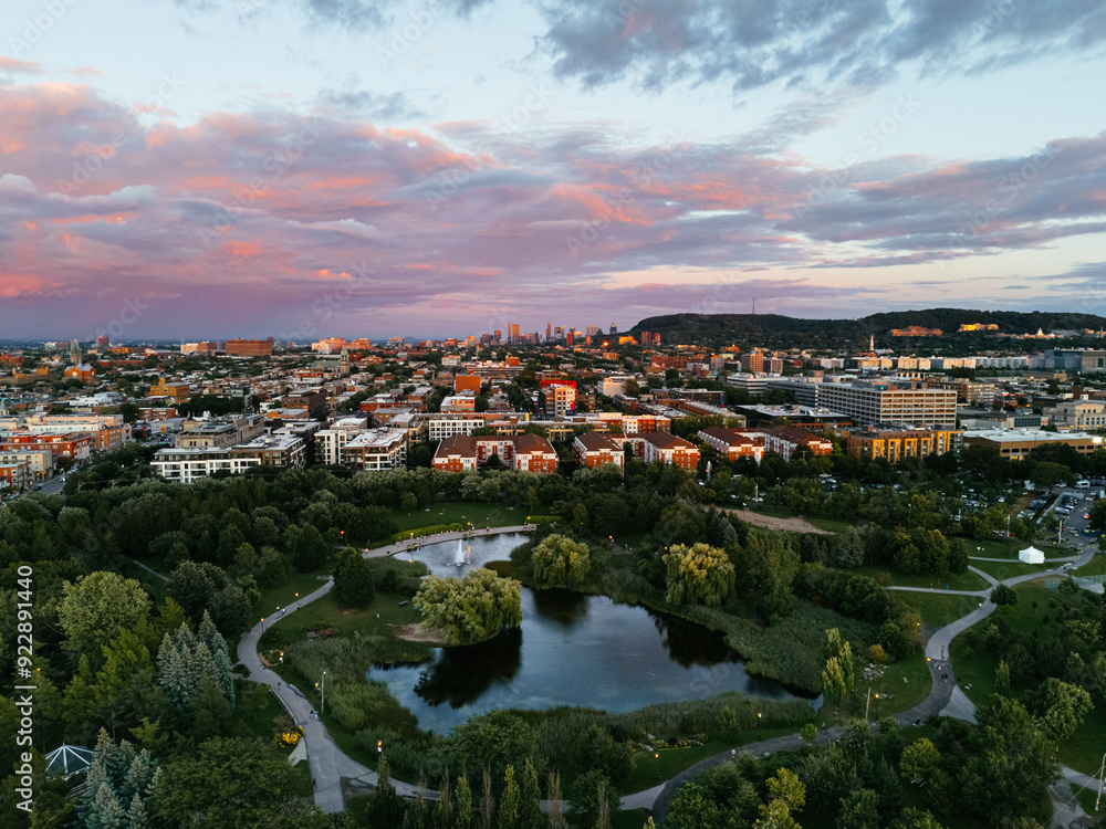 Drone view of the colorful sunset and park, downtown, and Royal Mountain in the background. Montreal, Canada. Drone view of the colorful sunset and park, downtown, and Royal Mountain in the background. Montreal, Canada.
