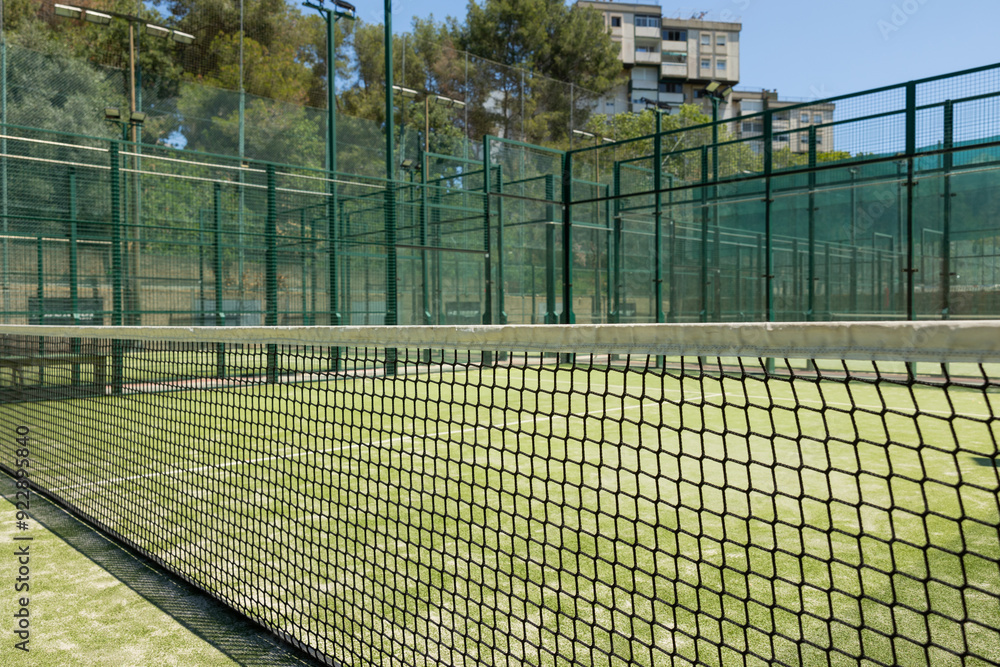Obraz premium Close-up of net on tennis court, stadion, arena. Sport lifestyle background. The concept of professional game sports