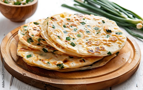 Plate of tasty Scallion pancakes with on white background. photo