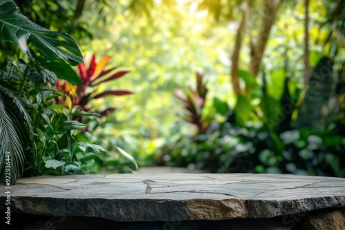 Stone tabletop podium floor in outdoors tropical garden forest blurred green leaf plant nature background.Natural product placement pedestal stand display,jungle paradise concept with generative ai